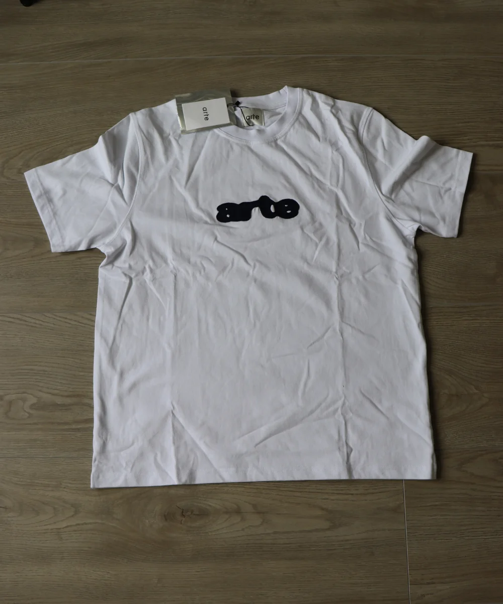 White embroidered-logo T-shirt laid flat