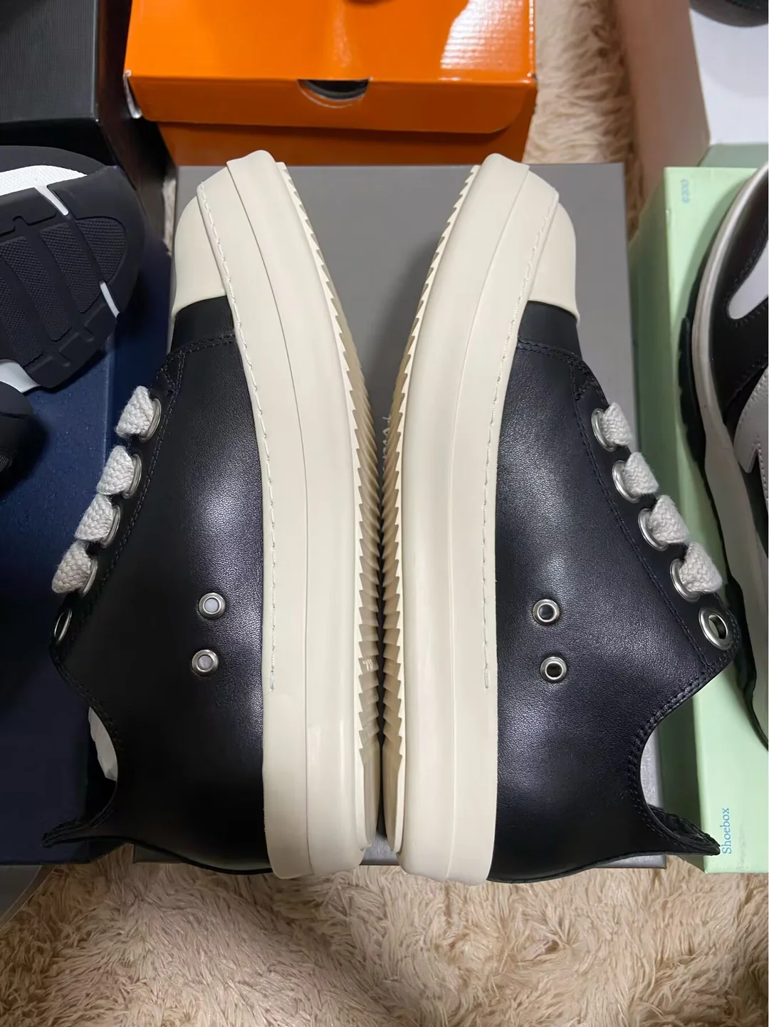 Dark high-top sneakers — outsole profile