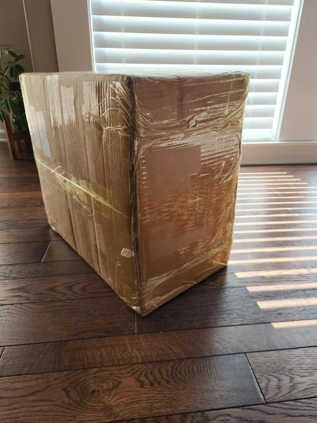 Wrapped Fishgoo shoe parcel after US sea-shipping delivery