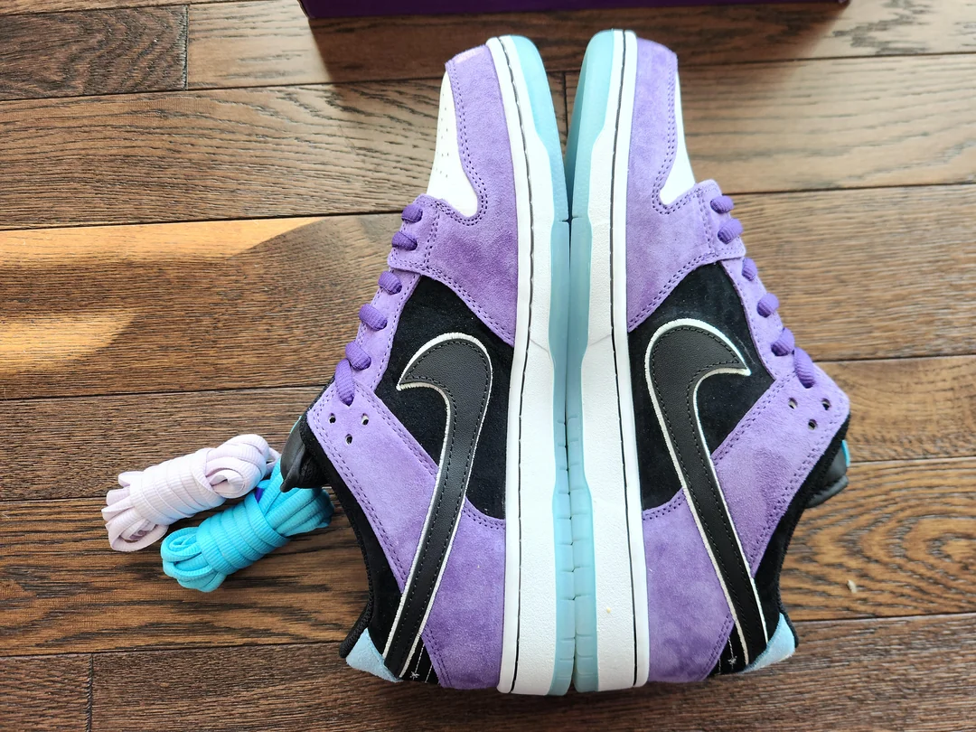 Purple SB sneakers — opposite side view
