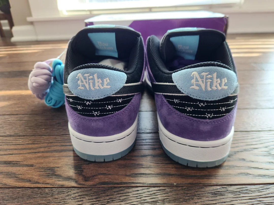 Purple SB sneakers — heels